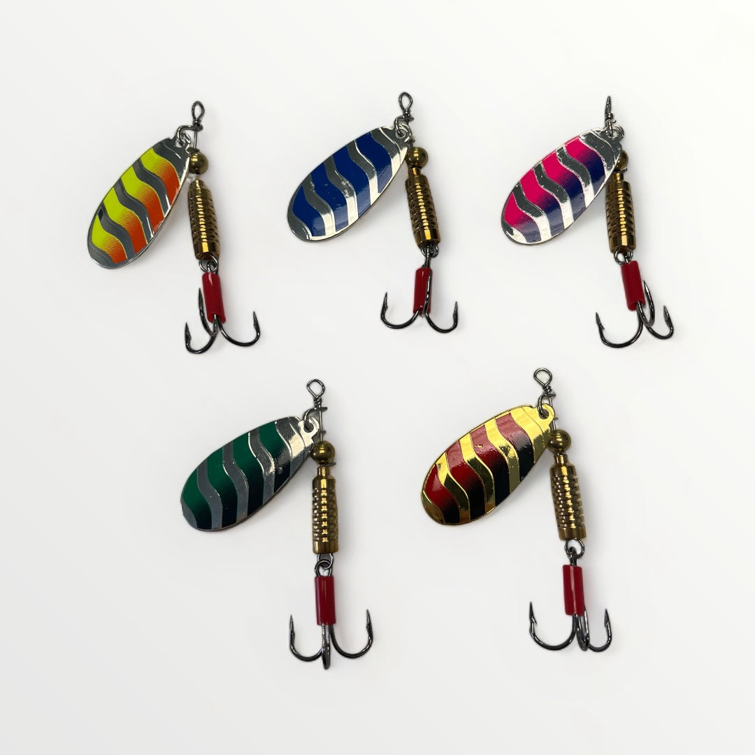 Vue de 5 cuillères de pêche TORPEDO SPOONS de couleurs variées.